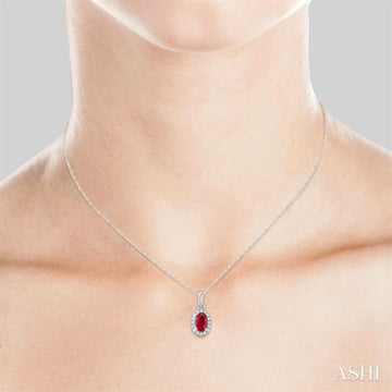 5x3 MM Oval Shape Ruby and 1/20 Ctw Single Cut Diamond Halo Precious Pendant with Chain in 10K White Gold